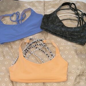 lululemon athletica Strappy Sports Bra Trio - Blue, Black, and Orange 3pc bundle